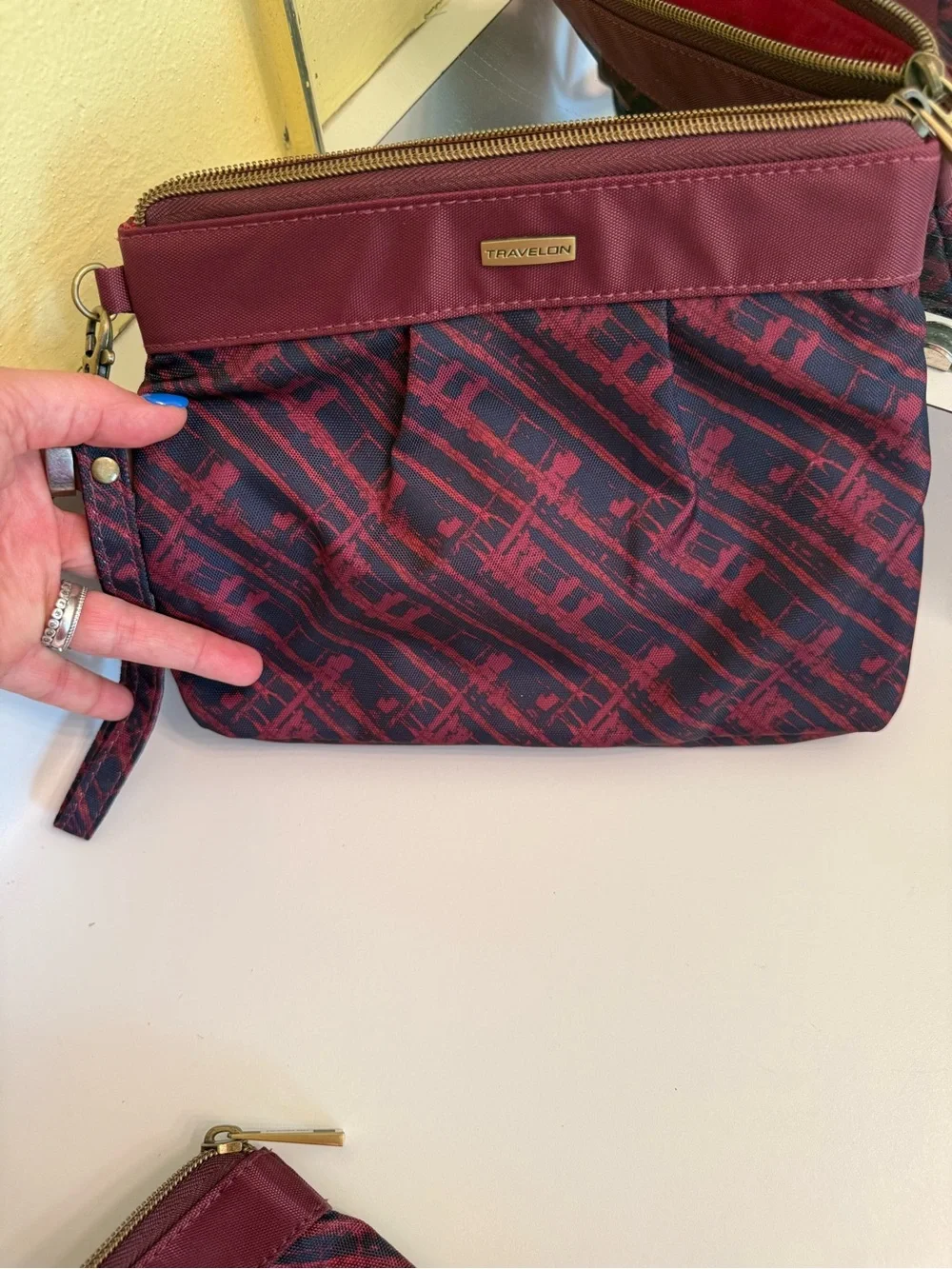 Travelon Burgundy and Navy Patterned pouch w, palette, brushes, and lip balm
